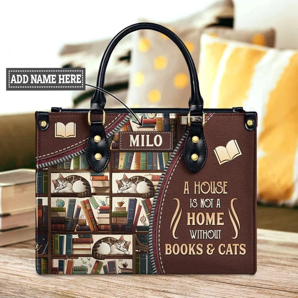 A House Is Not A Home Without Books And Cats Leather Bag